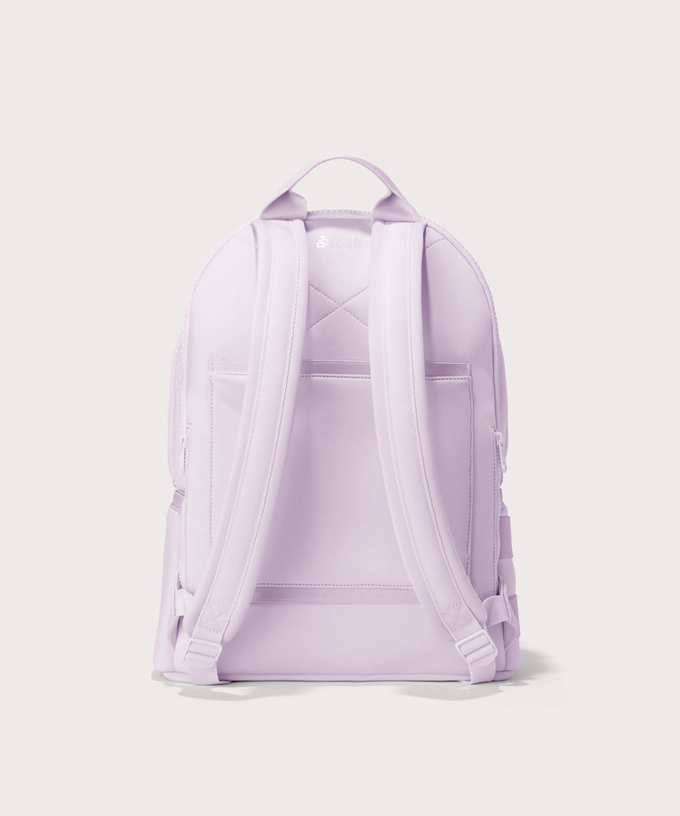 Dagne Dover large Dakota Neoprene Backpack in A soft purple with grey undertones seen from the back.
