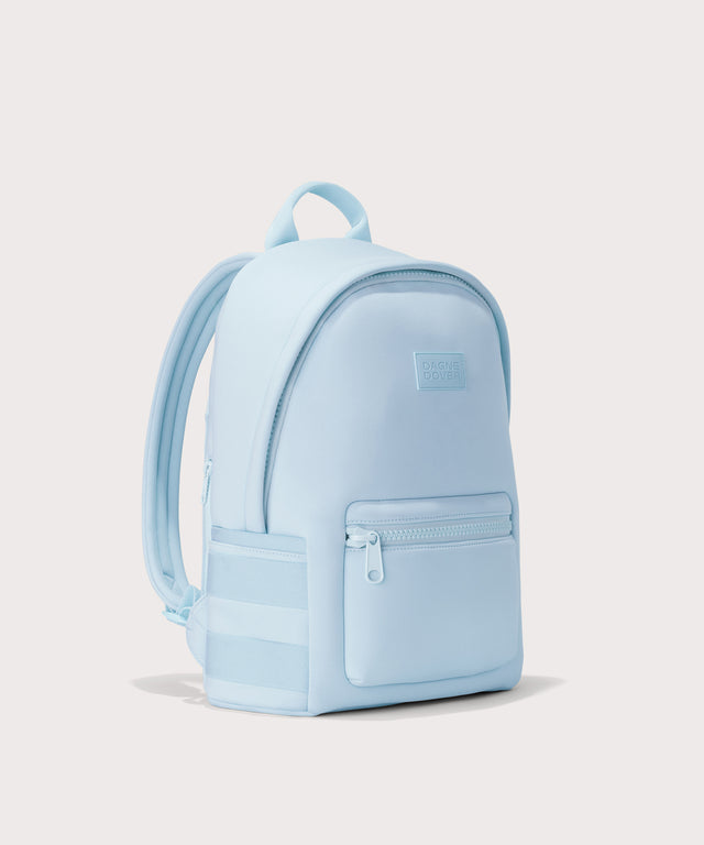 Dagne Dover medium Dakota Neoprene Backpack in an airy, lighter sky blue seen from an angle.
