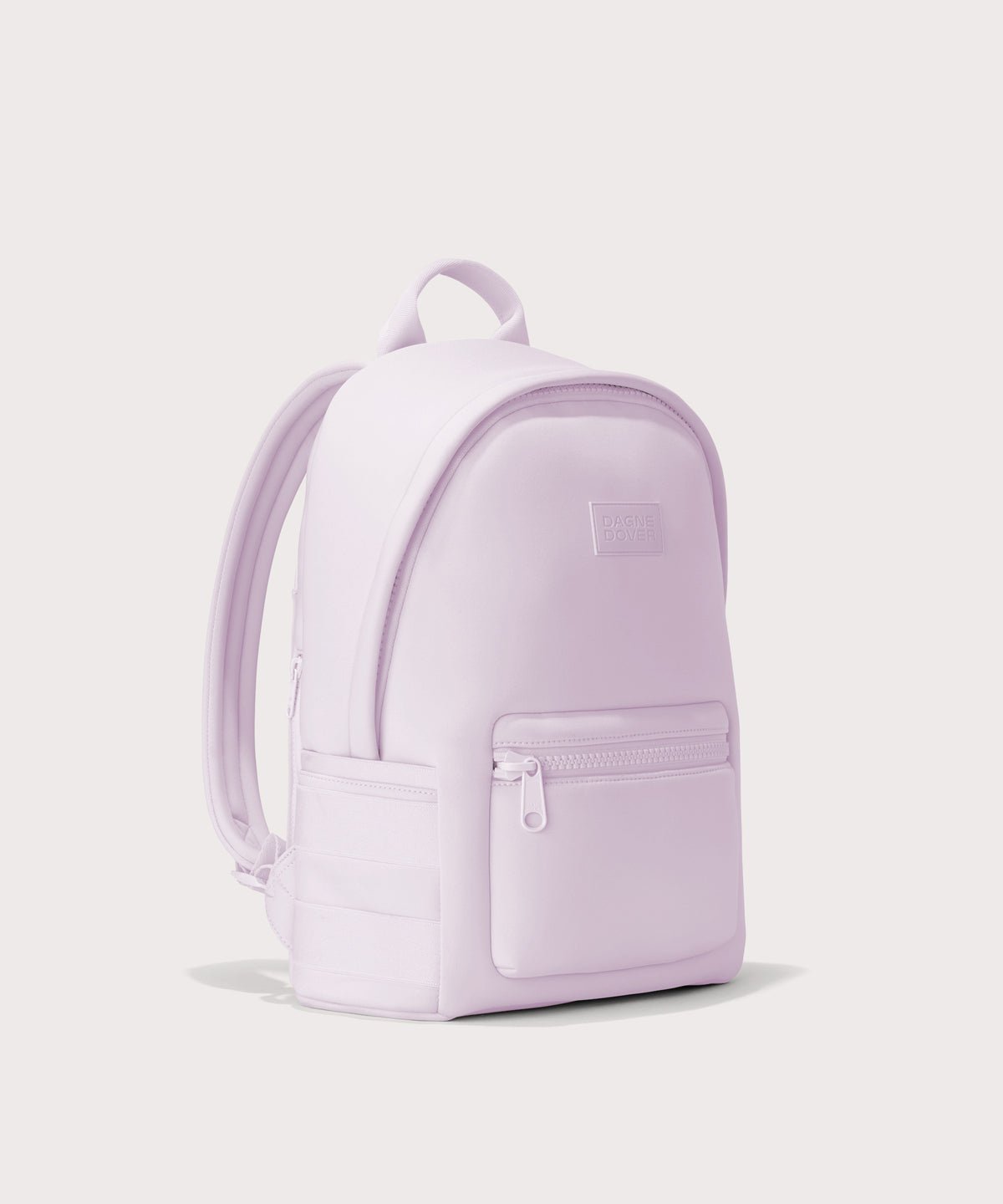 Dagne Dover medium Dakota Neoprene Backpack in a soft purple with grey undertones seen from an angle.
