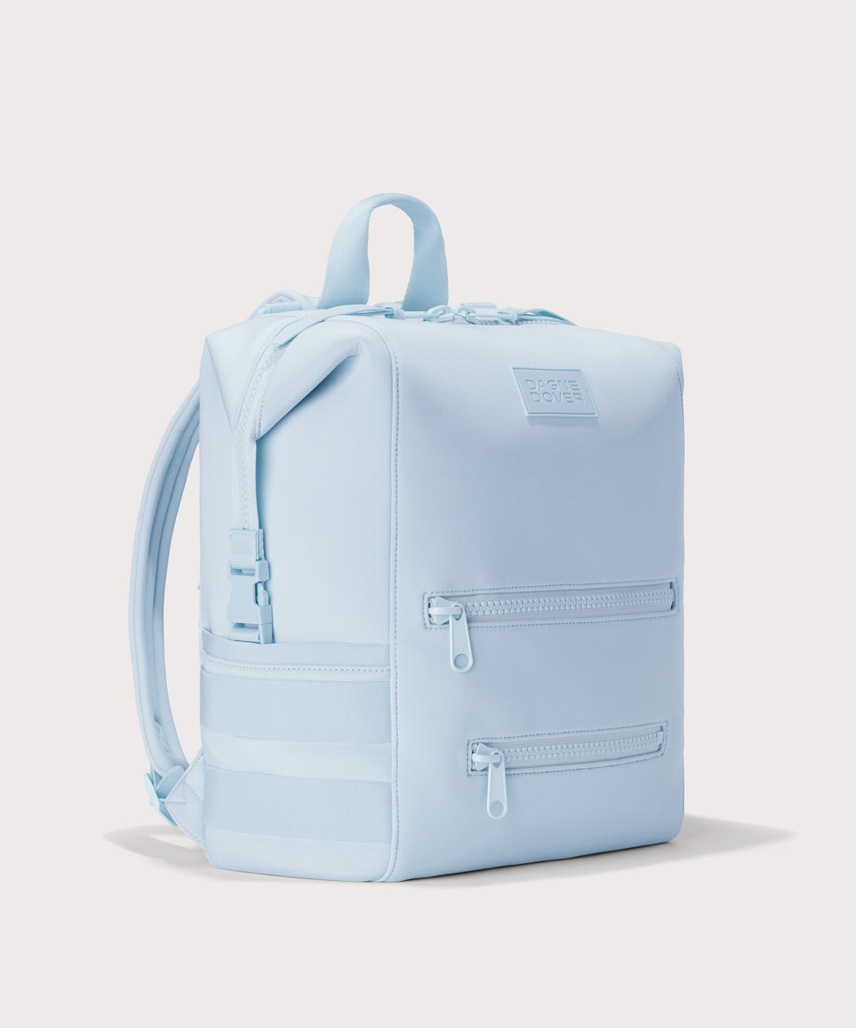 Dagne Dover Large Indi Diaper Backpack in an airy, lighter sky blue seen from an angle.
