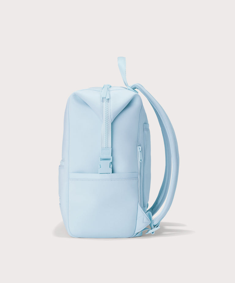 Dagne Dover Large Indi Diaper Backpack in an airy, lighter sky blue seen from the side.
