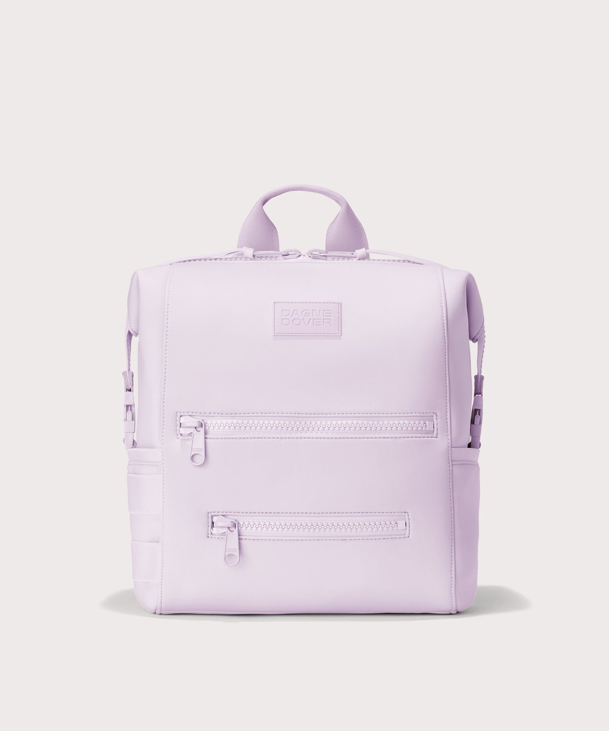 Dagne Dover Medium Indi Diaper Backpack in a soft purple with grey undertones.