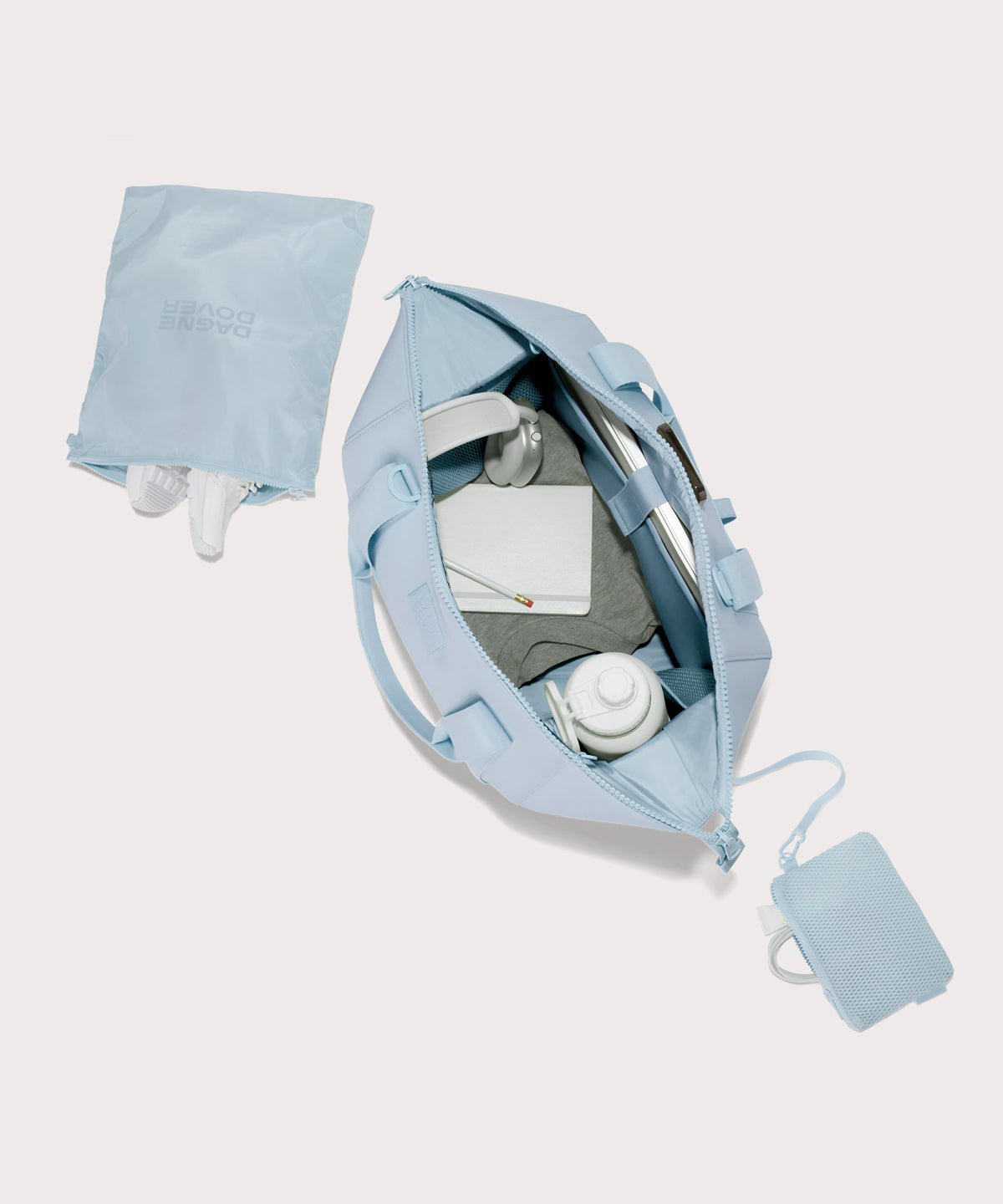 Large Landon Carryall in an airy, lighter sky blue unzipped, top down view
