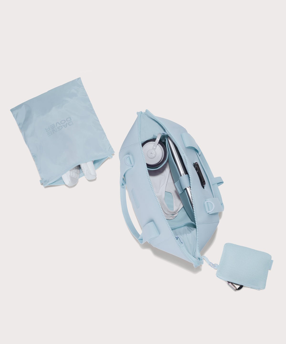 Large Landon Carryall in an airy, lighter sky blue unzipped, top down view