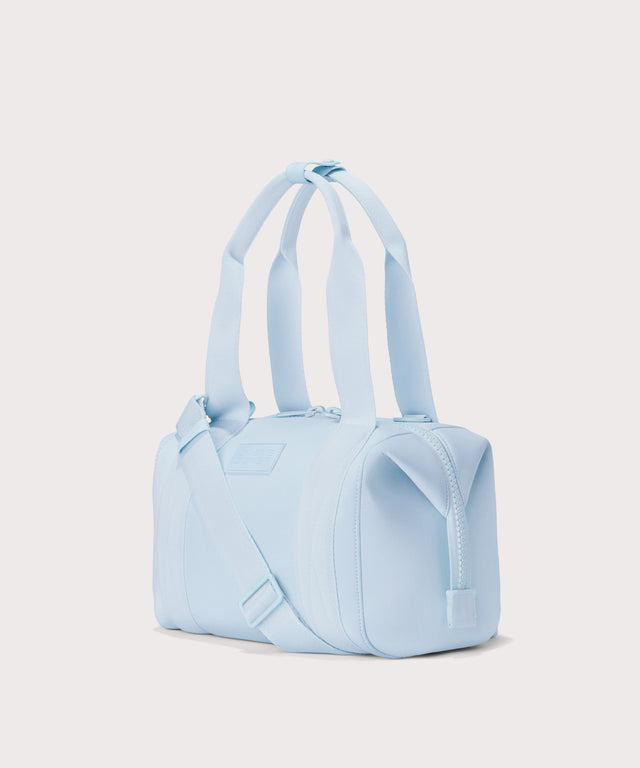 small Landon Carryall in an airy, lighter sky blue, side view
