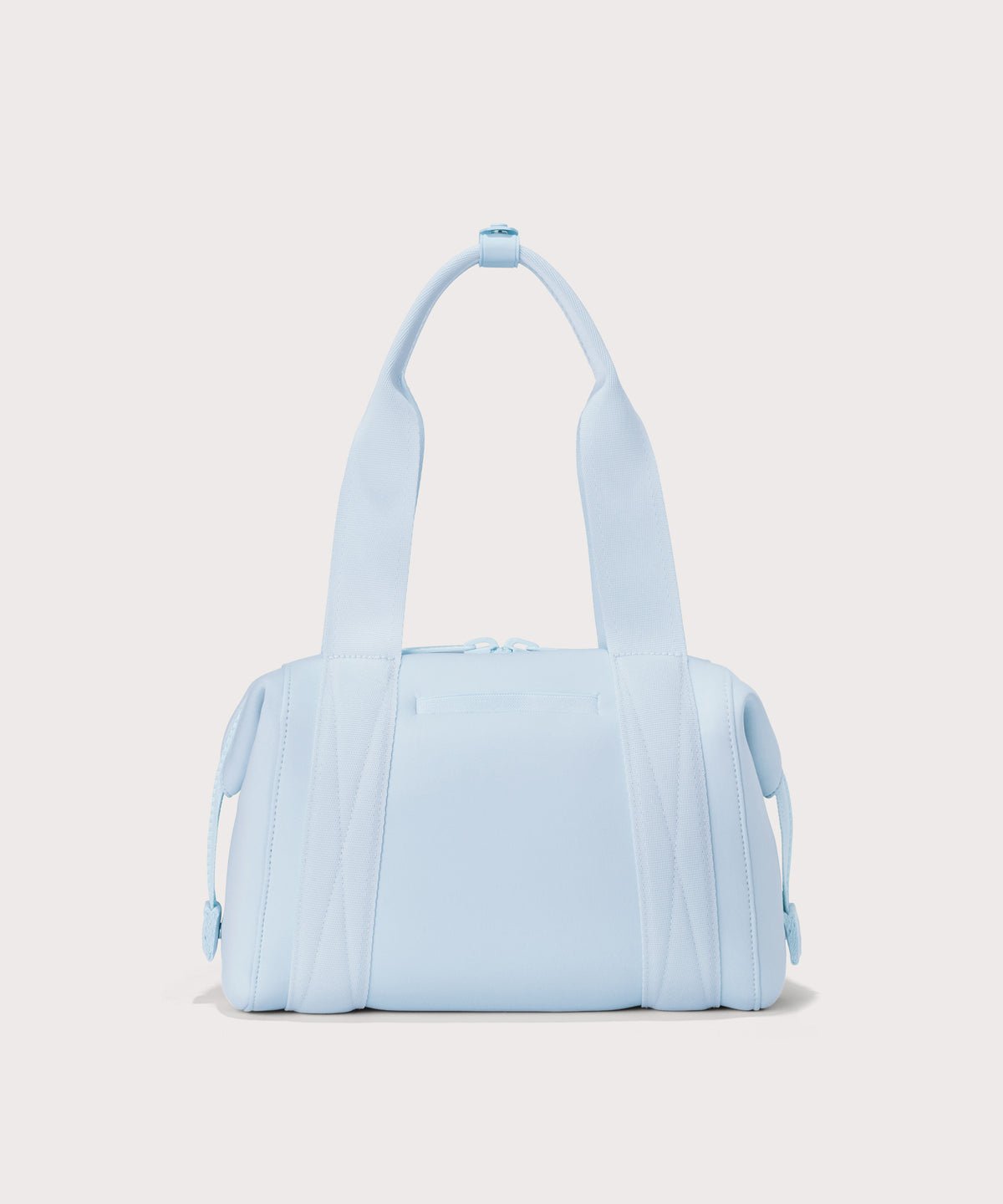 small Landon Carryall in an airy, lighter sky blue, displaying an exterior phone pocket
