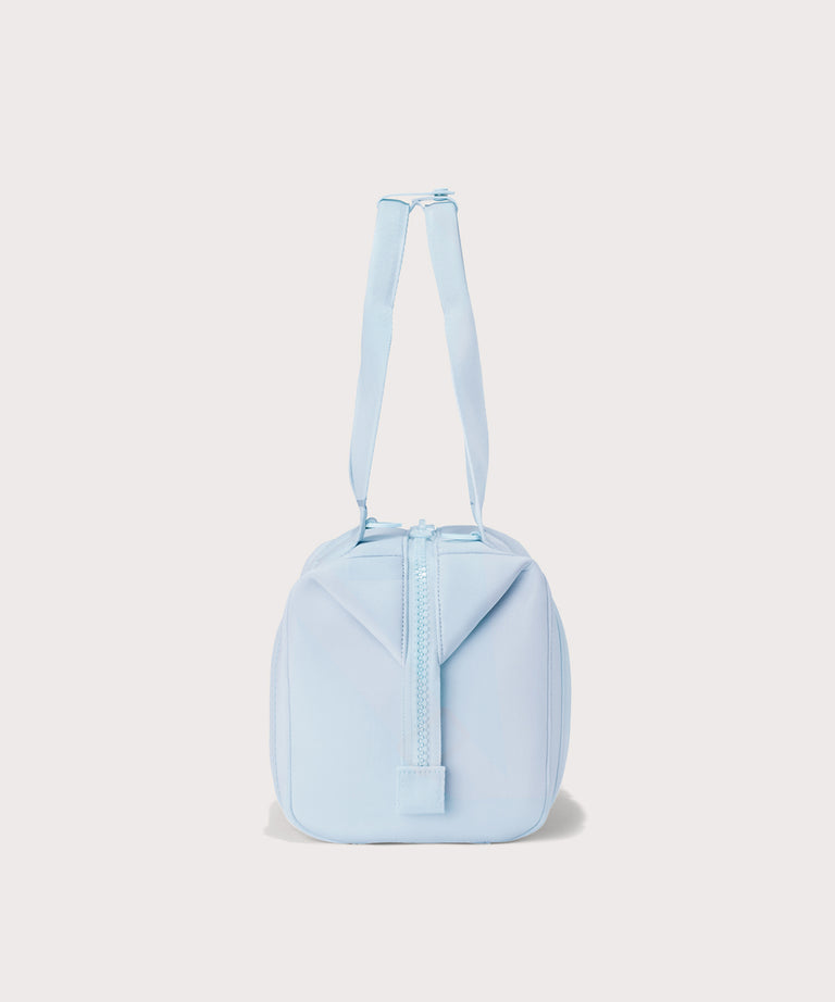 small Landon Carryall in an airy, lighter sky blue, side view
