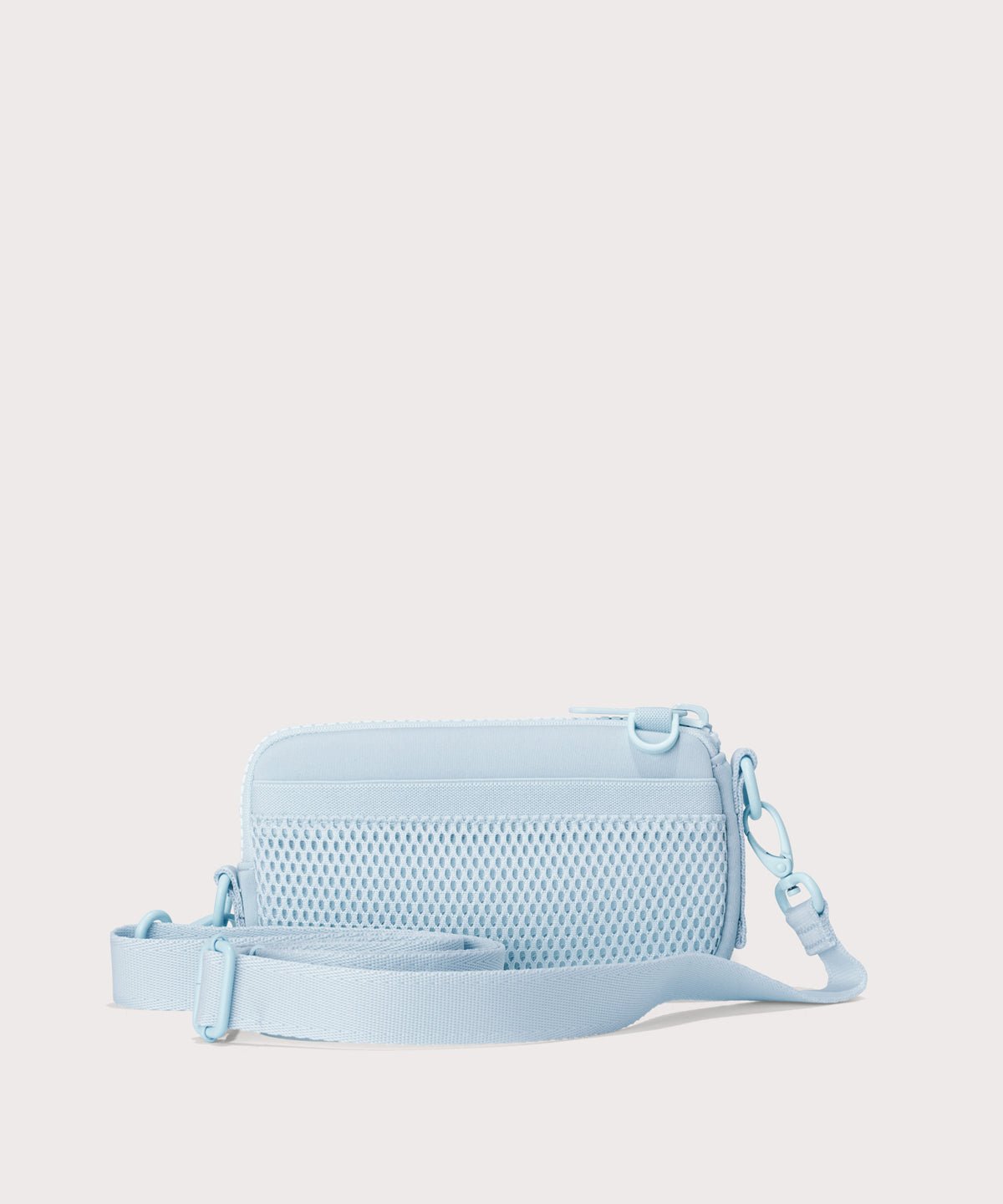 Dagne Dover Mara Phone Sling in an airy, lighter sky blue. showing the exterior air mesh slip.
