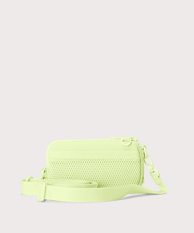 Dagne Dover Mara Phone Sling in matcha showing the exterior air mesh slip.
