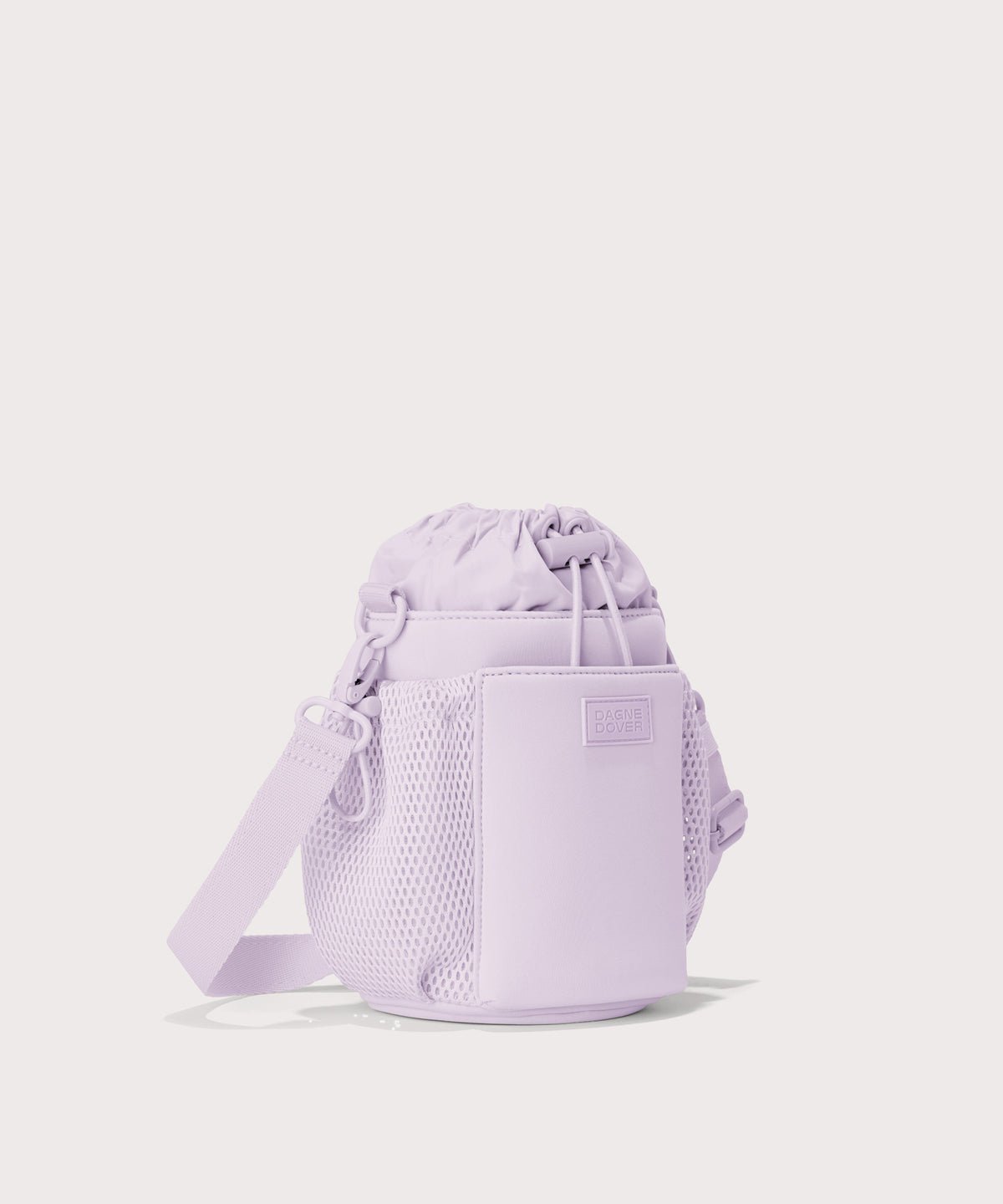 Dagne Dover Sloan Water Bottle Sling in a soft purple with grey undertones  seen from an angle.
