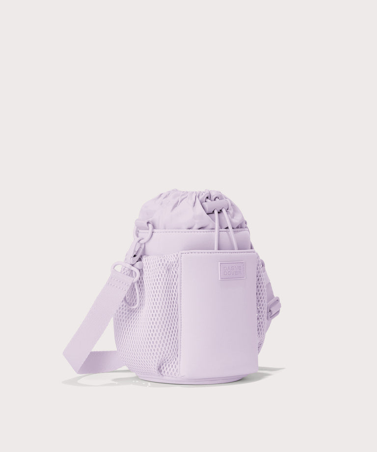Dagne Dover Sloan Water Bottle Sling in a soft purple with grey undertones  seen from an angle.
