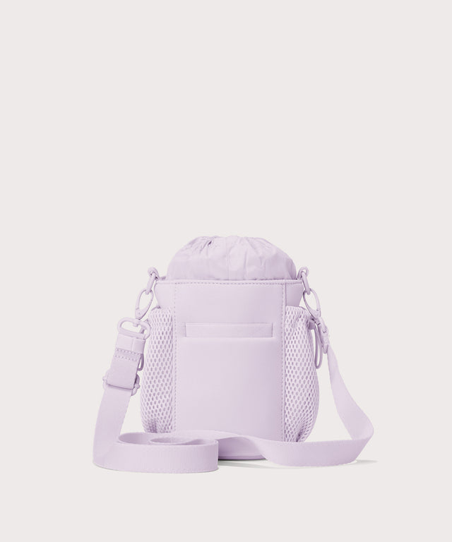 Dagne Dover Sloan Water Bottle Sling in a soft purple with grey undertones  seen from the back.
