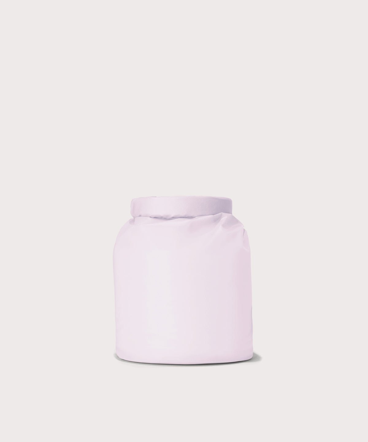 Dagne Dover Rae Roll-Top Dry Bag in a soft purple with grey undertones seen from the back.
