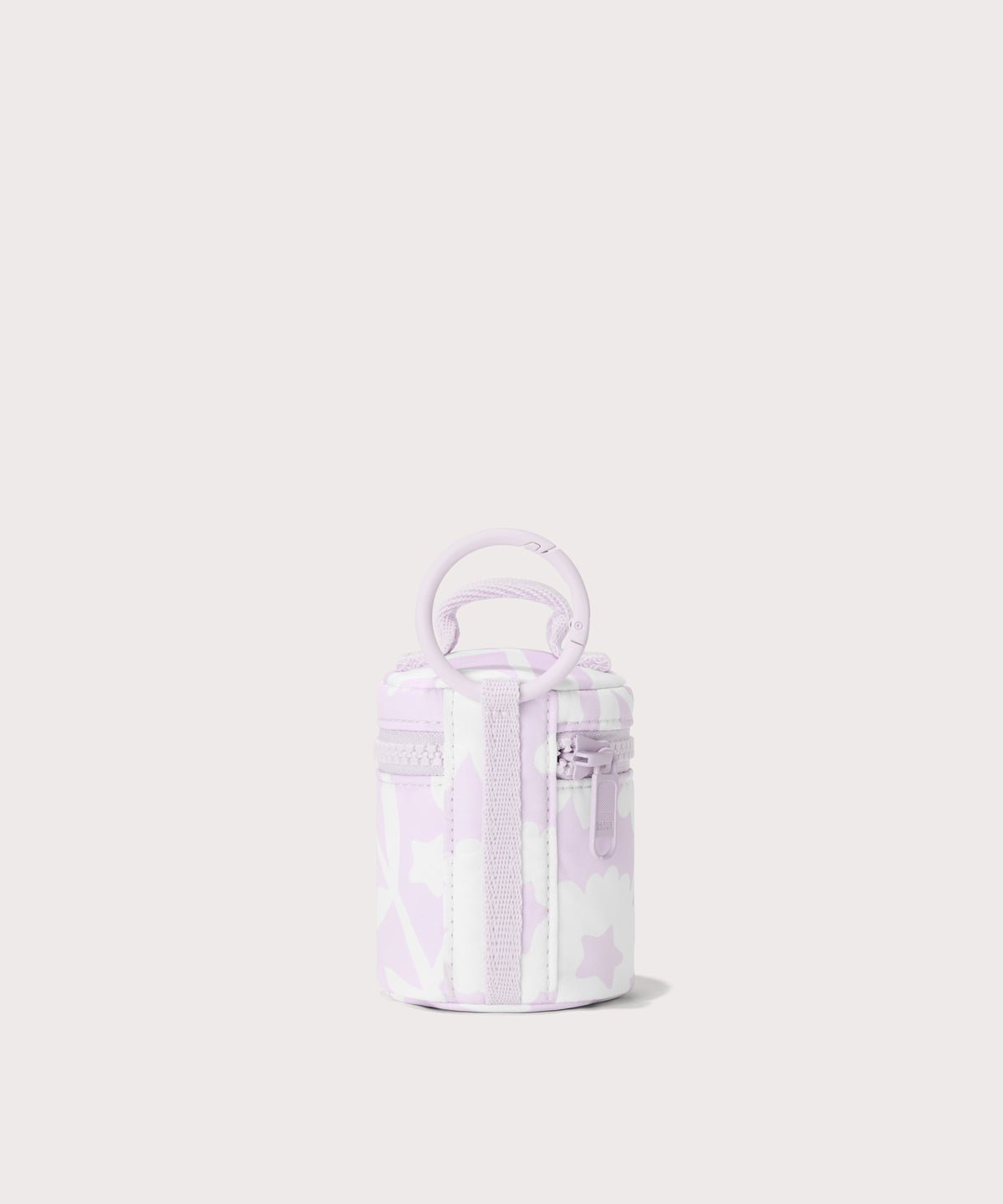 Dagne Dover Mila Keychain in a washed lilac and cream floral print seen from the back.
