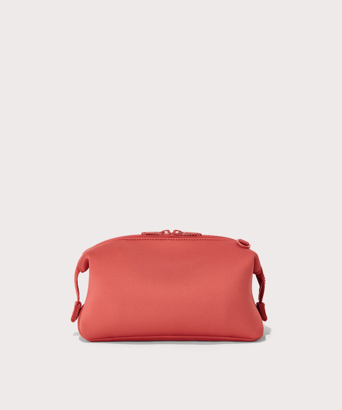 Dagne Dover large Hunter Toiletry Bag in a poppy, vintage wash red seen from the back.
