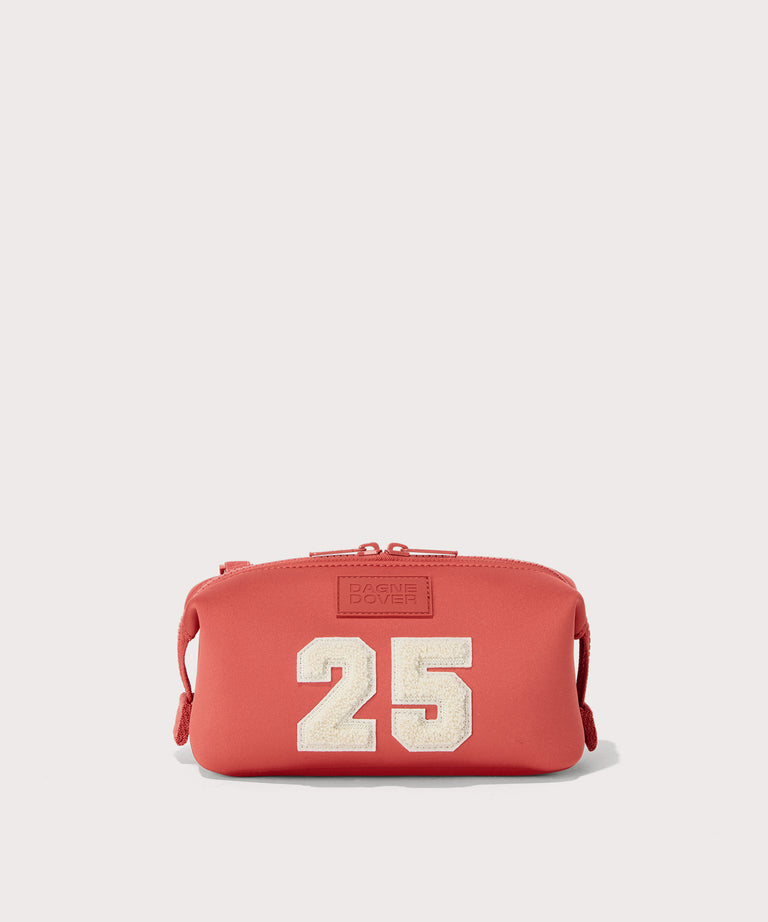 Dagne Dover Small Hunter Toiletry Bag in a poppy, vintage wash red.