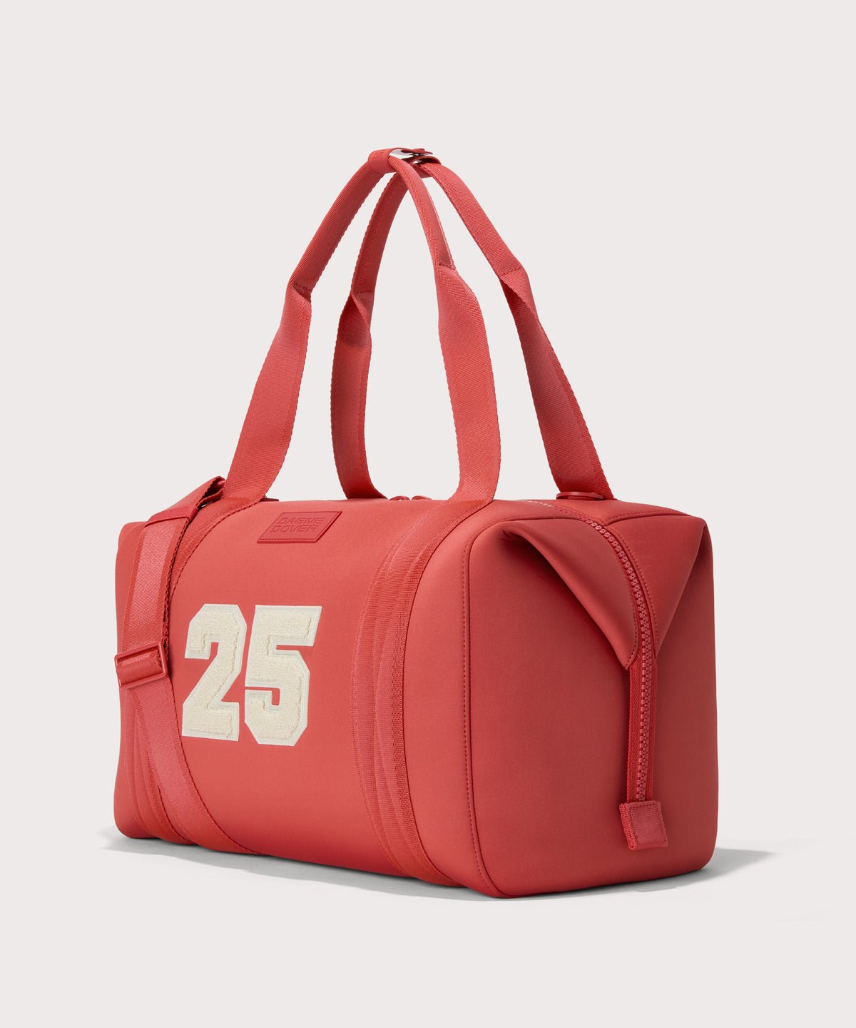 Large Landon Carryall in a poppy, vintage wash red, angle view
