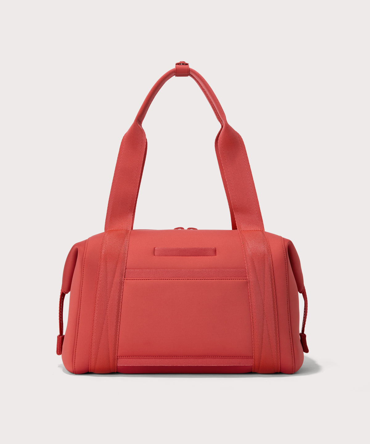 Large Landon Carryall in  a poppy, vintage wash red, displaying an exterior phone pocket
