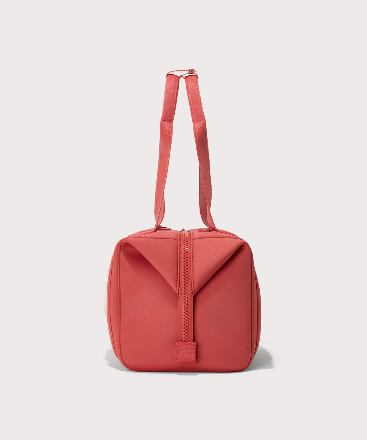 Large Landon Carryall in  a poppy, vintage wash red, side view
