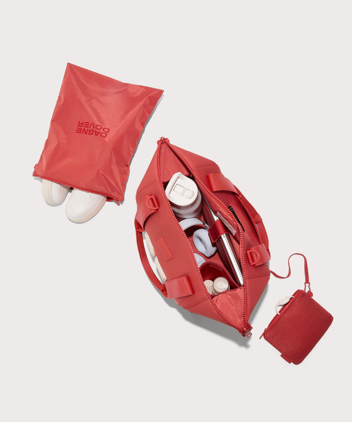 Large Landon Carryall in  a poppy, vintage wash red unzipped, top down view