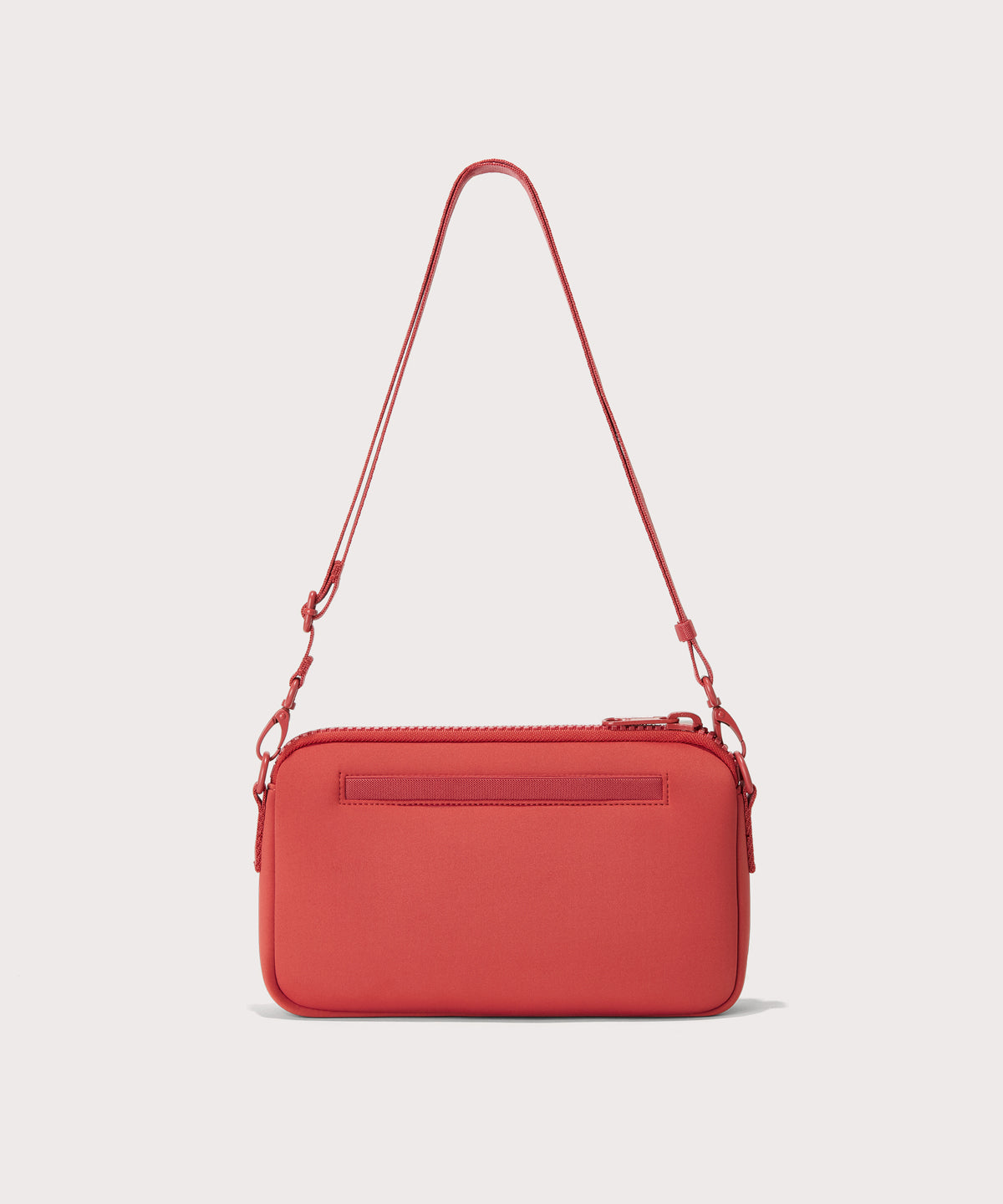 Dagne Dover Nora Shoulder Bag in a poppy, vintage wash red, back angle.
