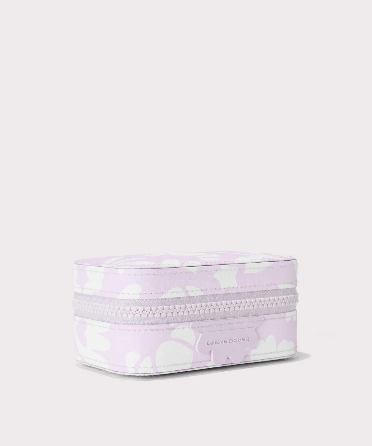 Dagne Dover small Frankie Jewelry Case in a custom washed lilac and cream floral print seen from an angle.
