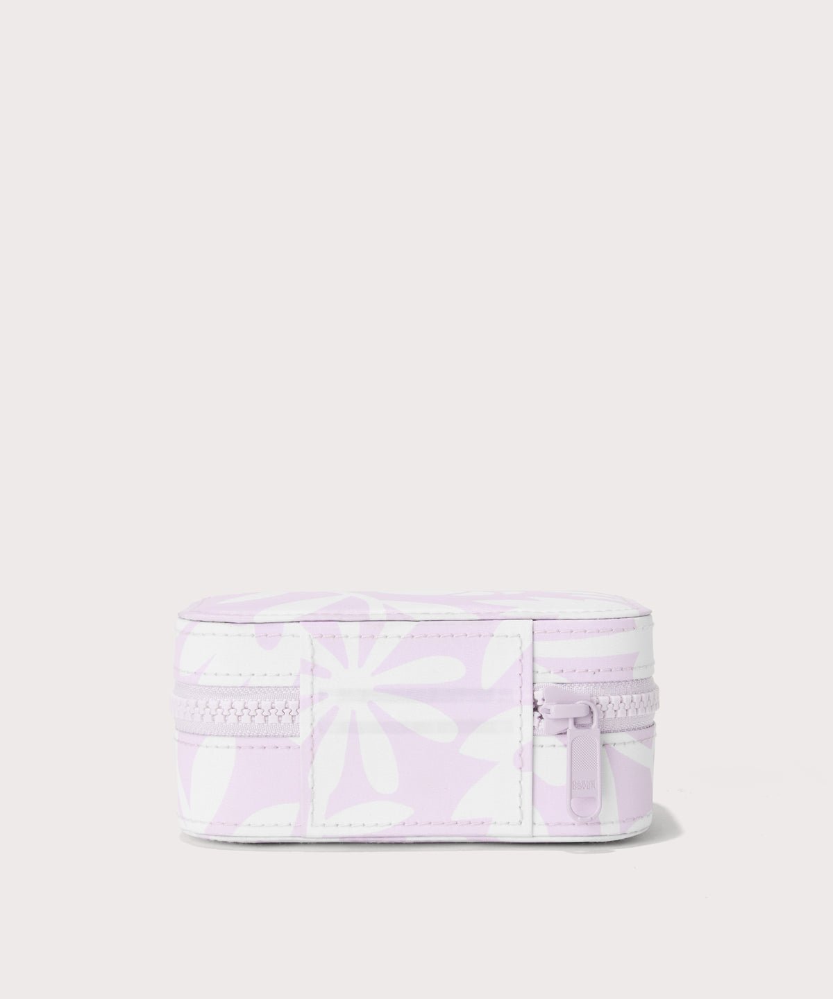 Dagne Dover small Frankie Jewelry Case in a custom washed lilac and cream floral print seen from the back.
