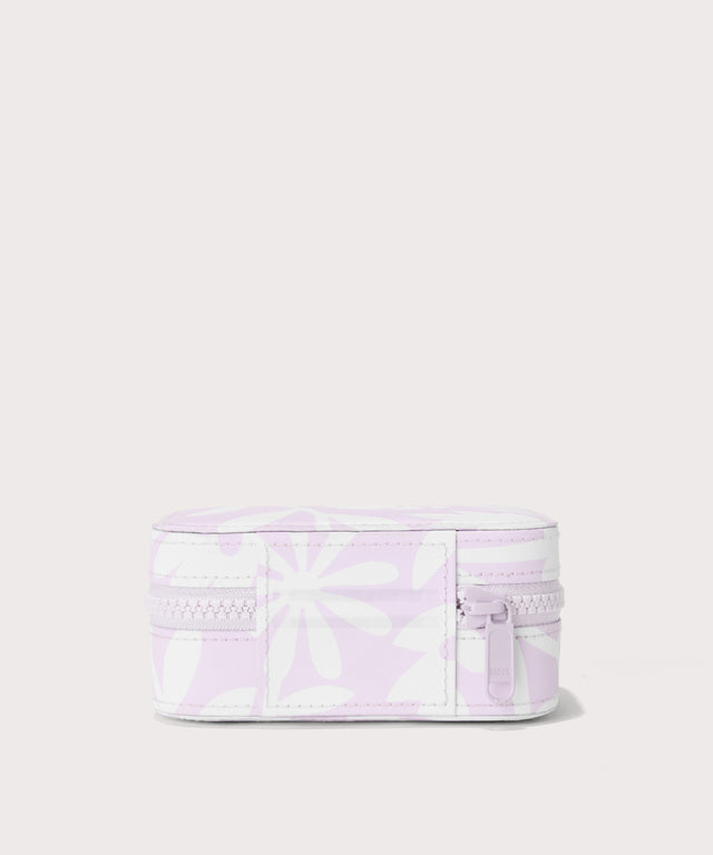 Dagne Dover small Frankie Jewelry Case in a custom washed lilac and cream floral print seen from the back.
