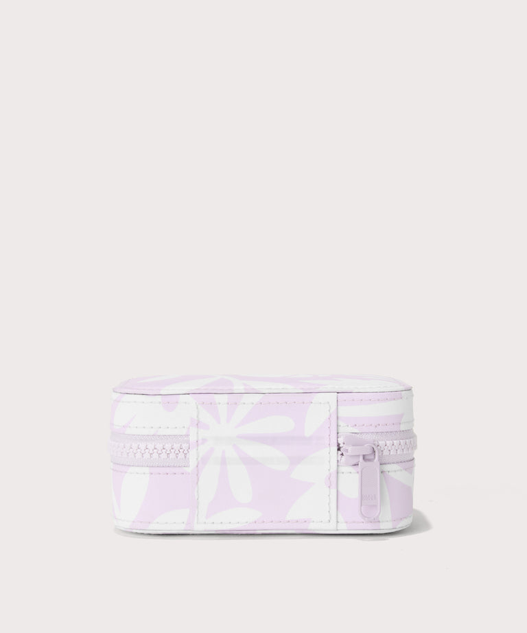Dagne Dover small Frankie Jewelry Case in a custom washed lilac and cream floral print seen from the back.
