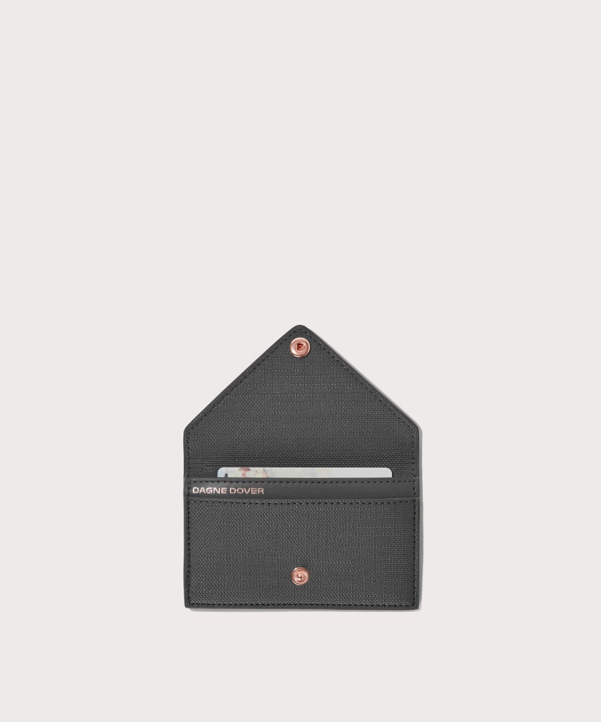 Dagne Dover vegan Card Case in grey opened revealing the two internal card slots.