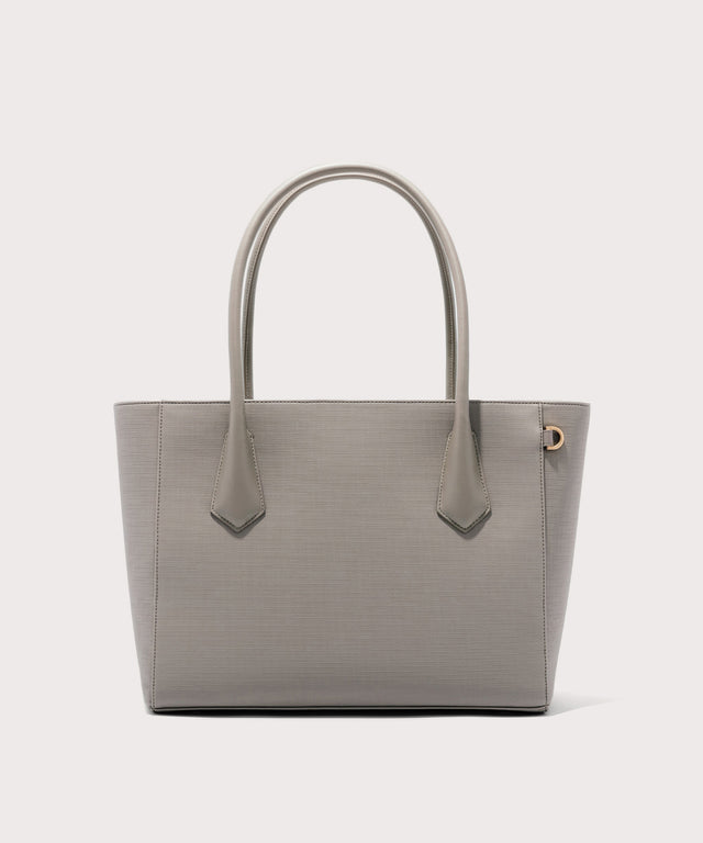 Dagne Dover Legend Signature Leather Tote in beige.
