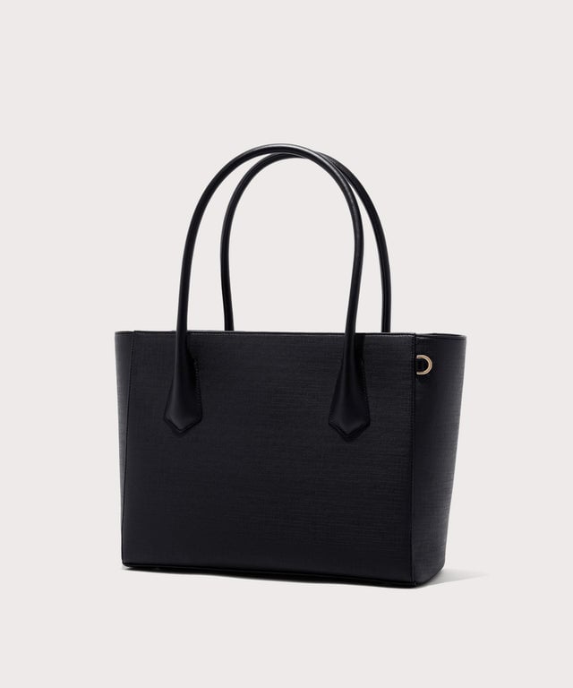 Dagne Dover Legend Signature Leather Tote in black seen from an angle.
