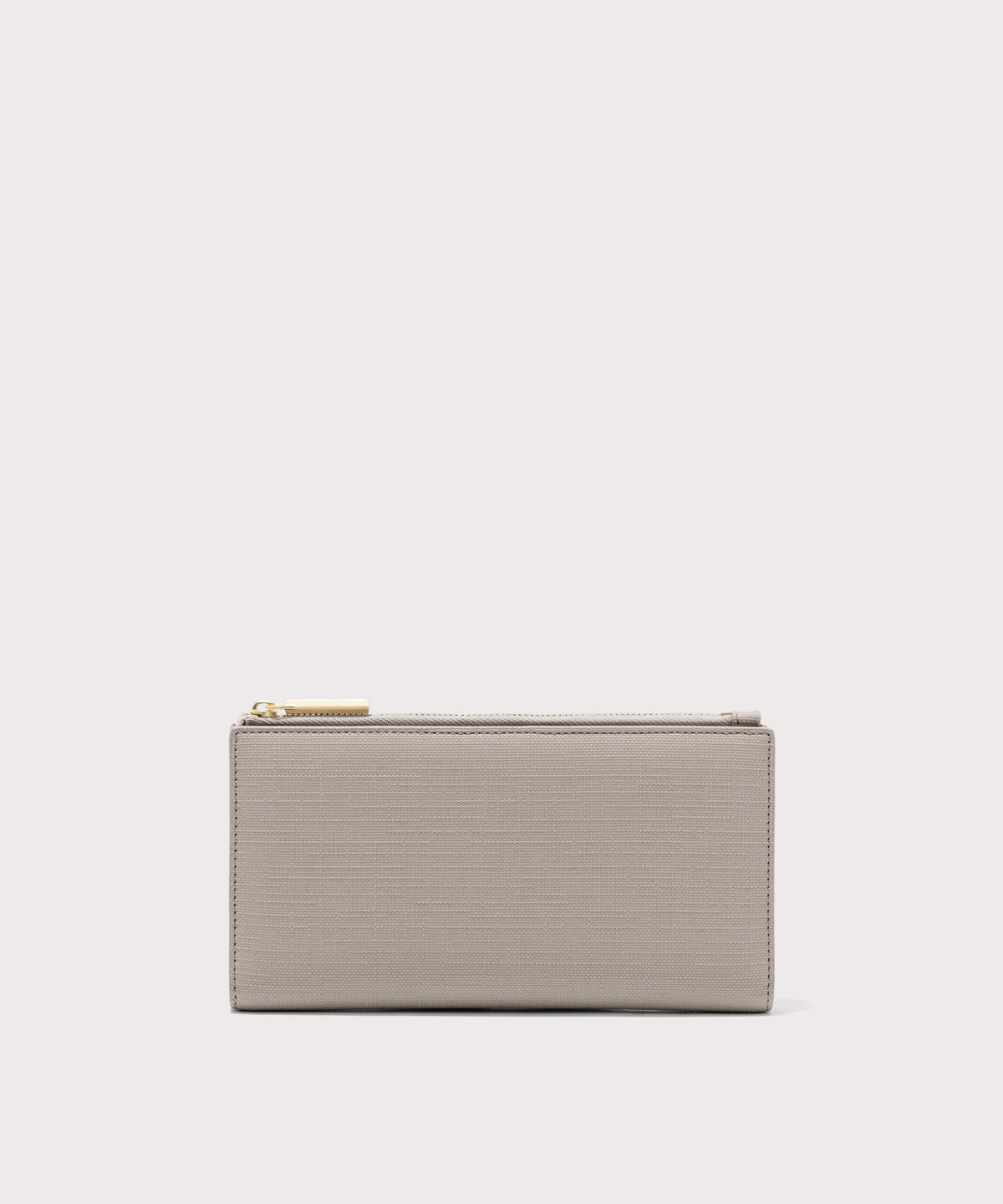 Dagne Dover Slim Wallet in beige.
