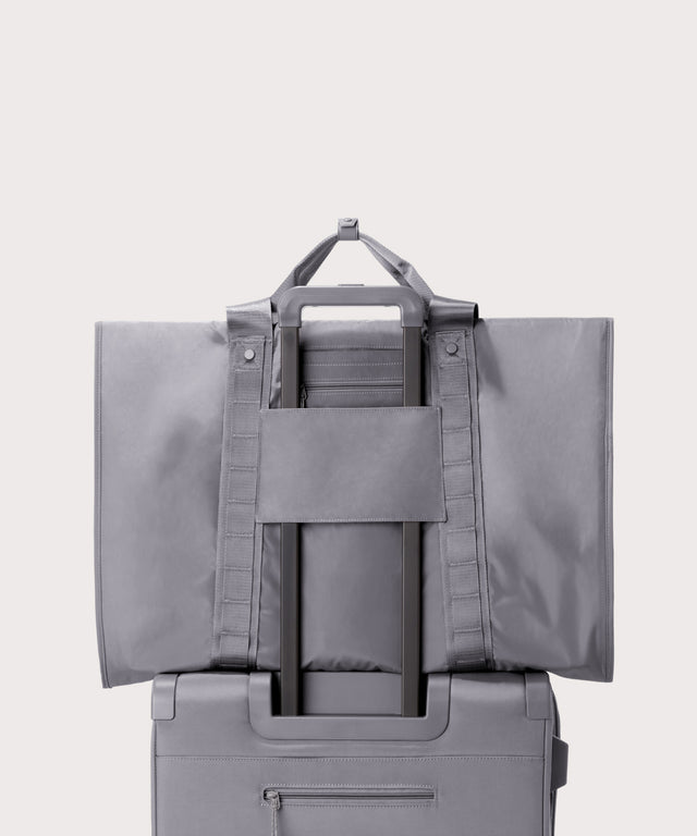 Back view of Capri garment bag in ash on luggage handle
