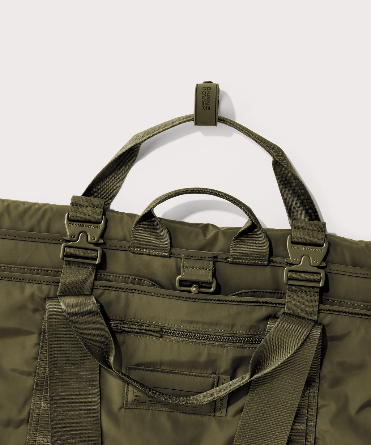 Detail shot of Capri garment bag in dark moss
