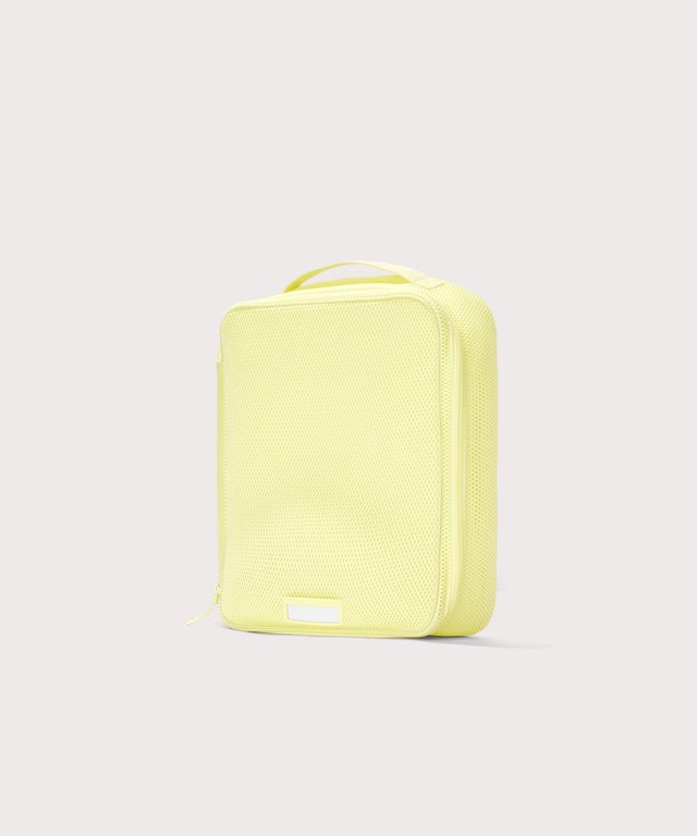 3/4 view of Large Roma packing cube in citrine
