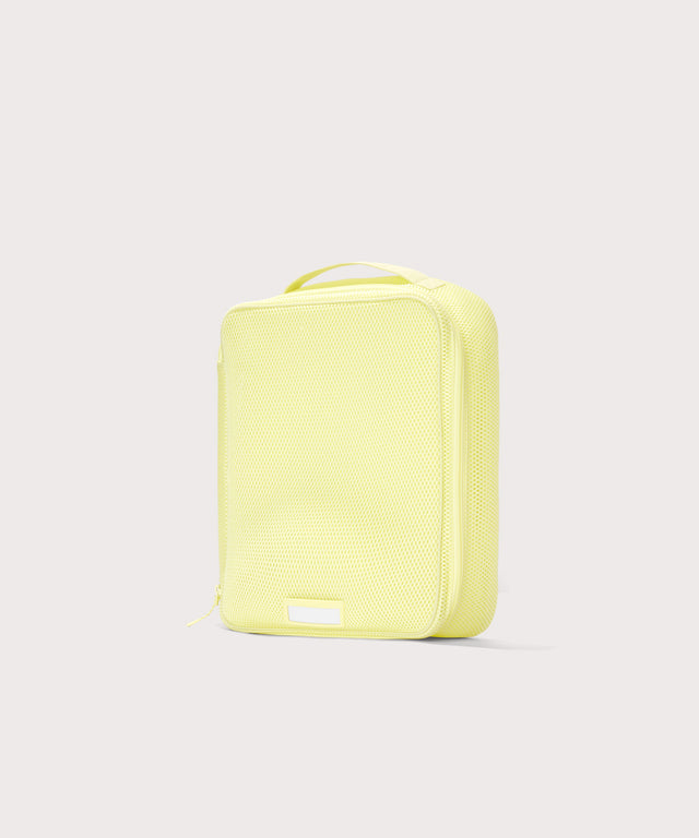 3/4 view of Large Roma packing cube in citrine
