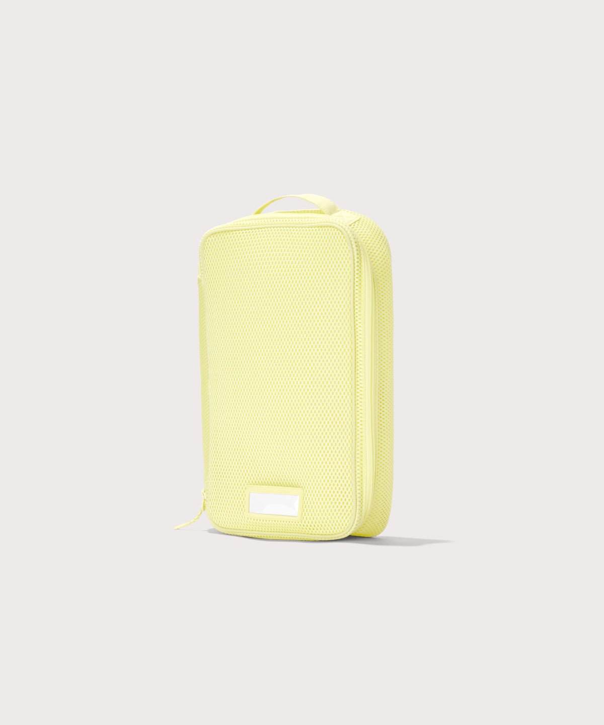 3/4 view of medium Roma packing cube in citrine

