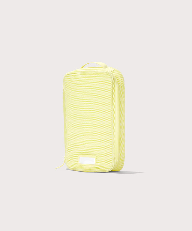 3/4 view of medium Roma packing cube in citrine
