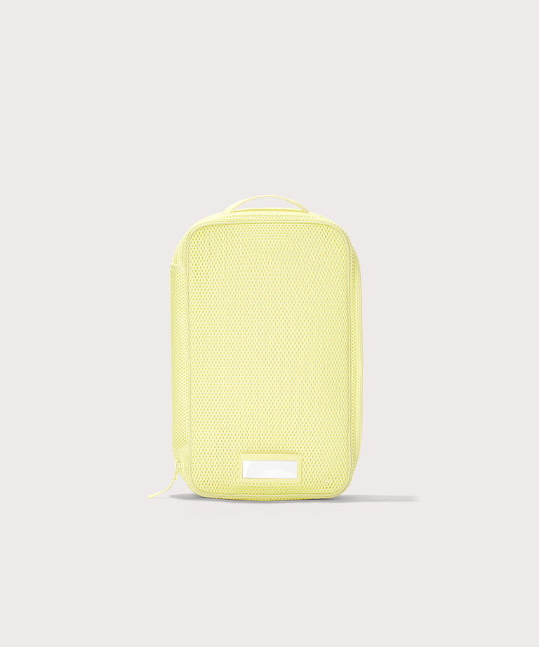 Front view of medium Roma packing cube in citrine
