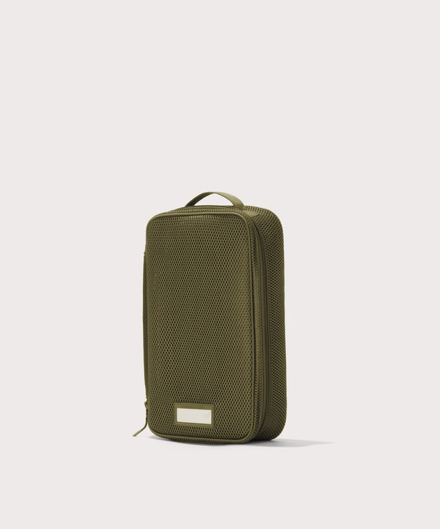 3/4 view of medium Roma packing cube in dark green