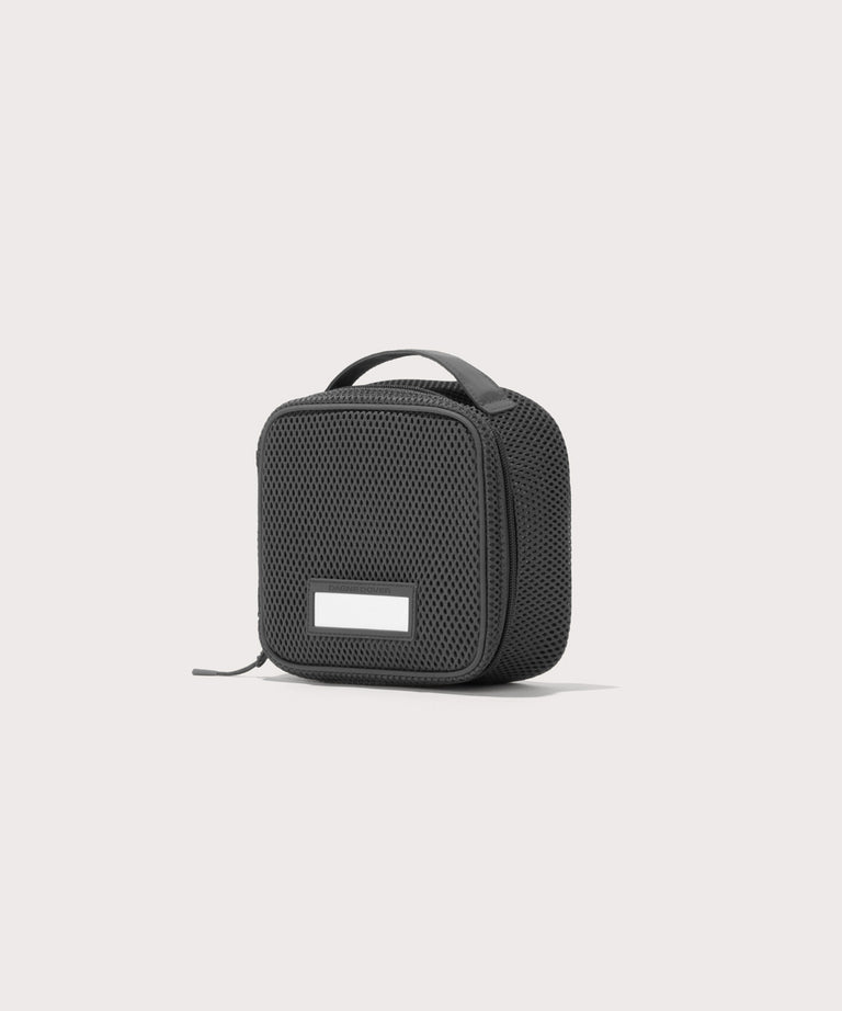 3/4 view of small Roma packing cube in carbon black
