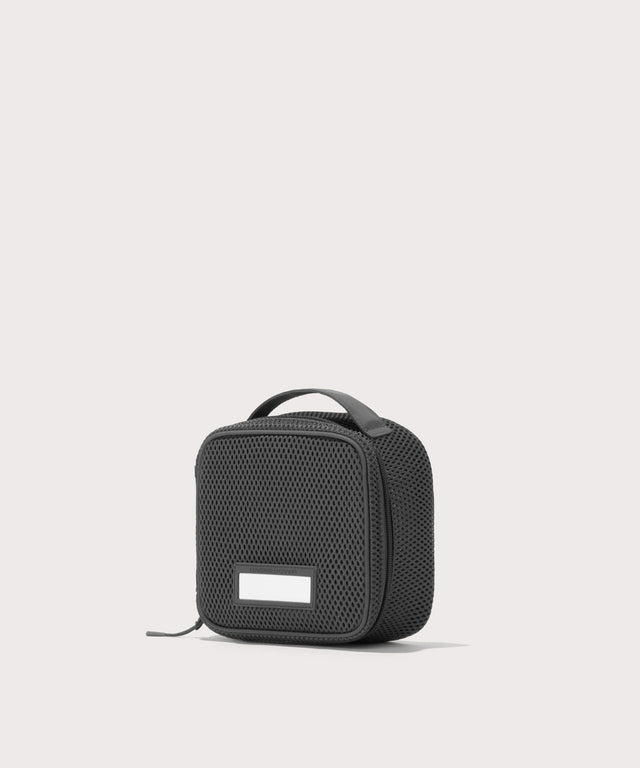 3/4 view of small Roma packing cube in carbon black
