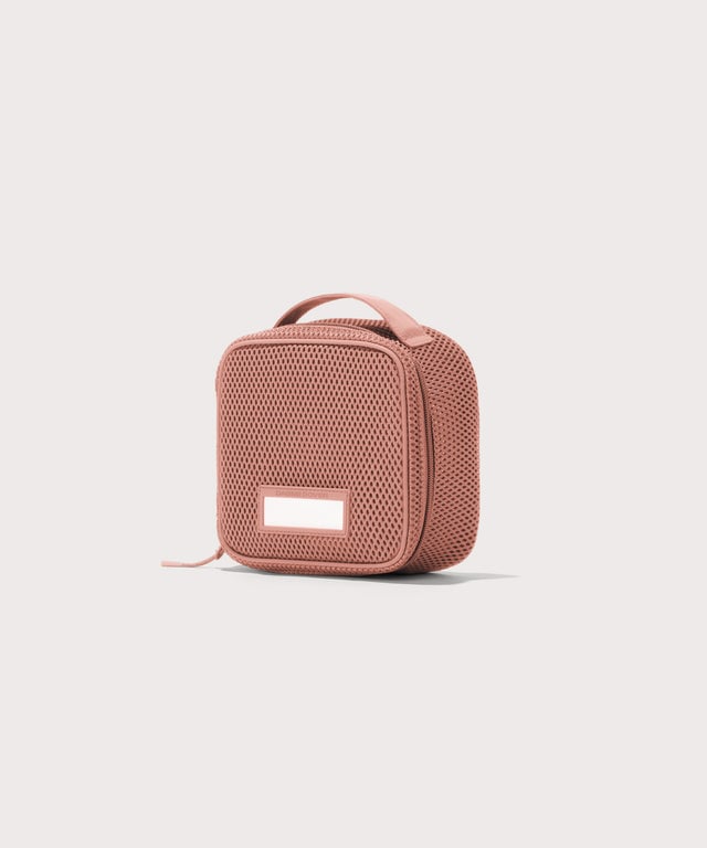3/4 view of small Roma packing cube in warm dust pink
