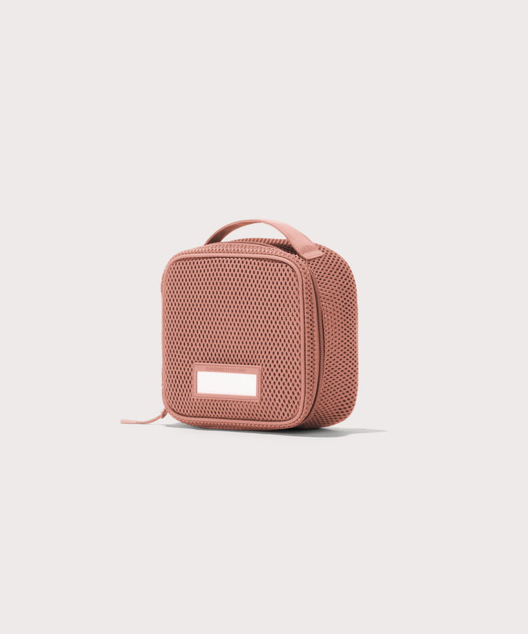 3/4 view of small Roma packing cube in warm dust pink
