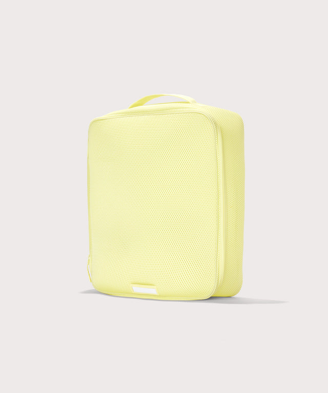 3/4 view of extra large Roma packing cube in citrine
