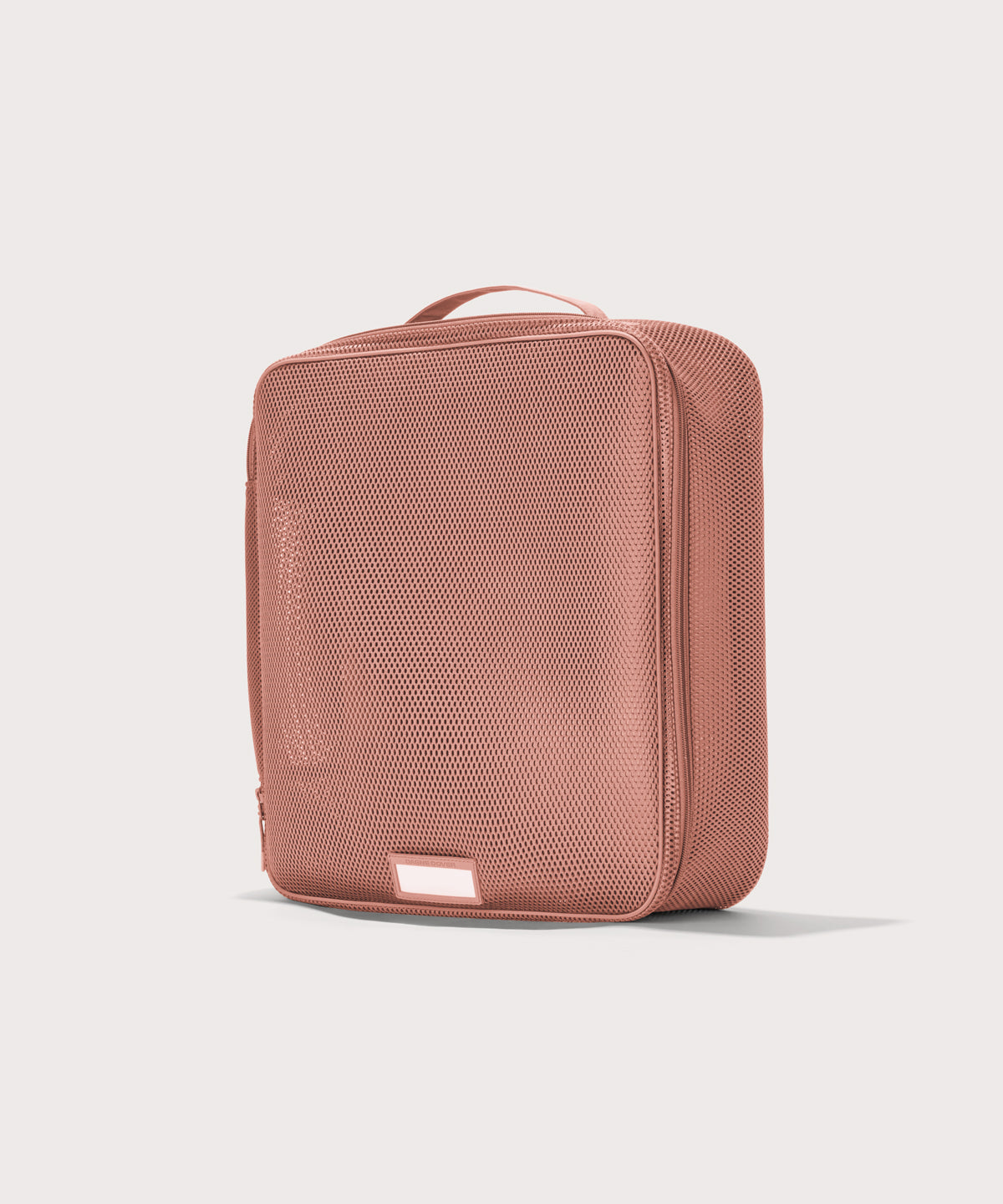 3/4 view of extra large Roma packing cube in warm dust pink
