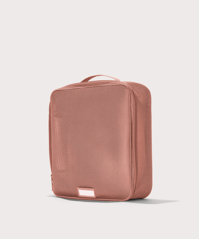 3/4 view of extra large Roma packing cube in warm dust pink