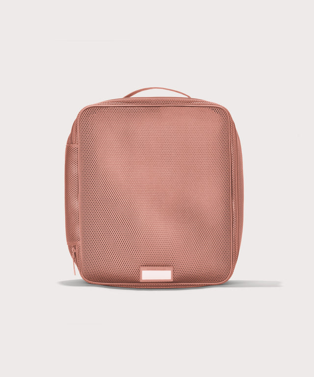 Front view of extra large Roma packing cube in warm dust pink
