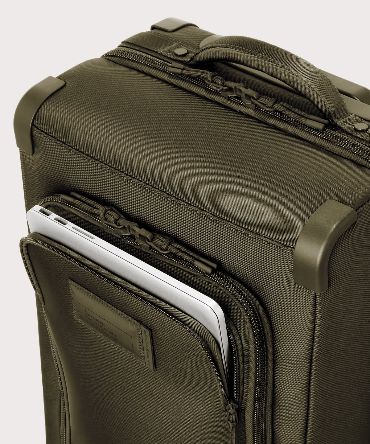 Caption: Front pocket fits most 13” laptops
